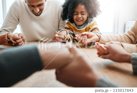 Praying, together and family holding hands for worship, support and church service. Happy, hope and a father, child and people with prayer, faith and belief in religion, grateful and praising Praying, together and family holding hands for worship, support and church service. Happy, hope and a father, child and people with prayer, faith and belief in religion, grateful and praising 133017843