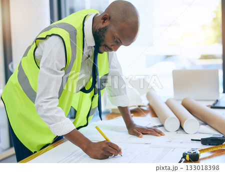 Architect, blueprint and man writing in office on paper, design and planning building project. Construction, engineer and male project manager with plan for property, model or renovation strategy 133018398
