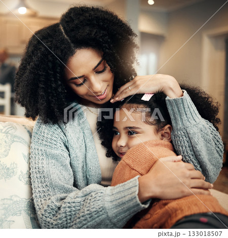 Family, love or kid hug mother for Mothers Day, home bonding or embrace on living room couch. Care, custody and biracial mom, mama or woman with female youth child, girl or daughter on apartment sofa 133018507