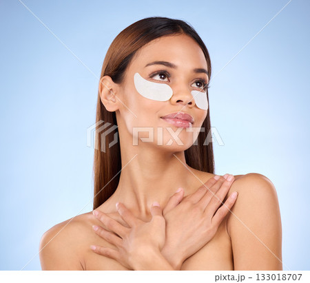 Skincare, collagen and woman with eye mask for anti aging beauty routine on blue background mockup. Cosmetics, facial repair and face of hispanic model with detox treatment product in studio promo. 133018707