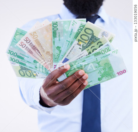 Finance, money and hands of black man in studio for winner, investment and wealthy. Success, payment and profit with male holding cash isolated on white background for cashback, salary and rich Finance, money and hands of black man in studio for winner, investment and wealthy. Success, payment and profit with male holding cash isolated on white background for cashback, salary and rich 133019056