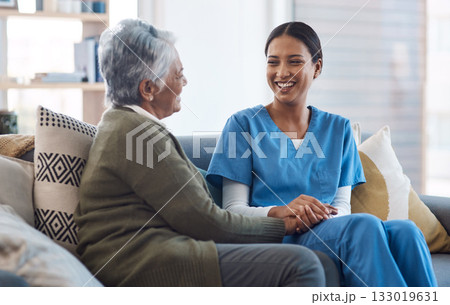 Healthcare, support and a nurse talking to an old woman in a nursing home during a visit or checkup. Medical, empathy and a female medicine professional having a conversation with a senior resident Healthcare, support and a nurse talking to an old woman in a nursing home during a visit or checkup. Medical, empathy and a female medicine professional having a conversation with a senior resident 133019631