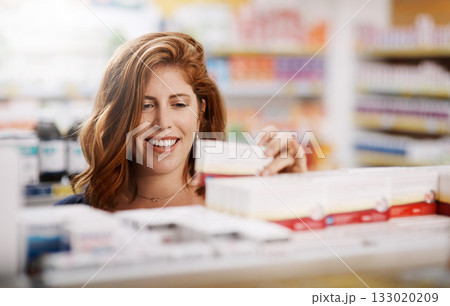 Happy woman, shopping and pharmacy on shelf for pills, medication or drugs for healthcare at store. Female person, customer or patient checking pharmaceutical products, medicine or stock at a clinic Happy woman, shopping and pharmacy on shelf for pills, medication or drugs for healthcare at store. Female person, customer or patient checking pharmaceutical products, medicine or stock at a clinic 133020209