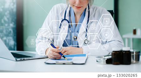 Dentist using tablet and digital interfaces for modern dental care, showcasing innovative technology, advanced healthcare, and professional oral treatment solutions. 133020265