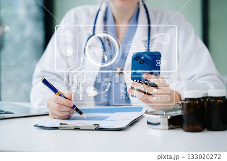 Medical technology, doctor use AI robots for diagnosis and increasing accuracy patient treatment in future. doctor hand working with tablet, computer with his team Medical research to improve patient 133020272