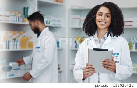 Smile, tablet and portrait of woman pharmacist with online checklist and happy to help with advice. Confidence, medicine and medical professional and healthcare consultant in wellness pharmacy. 133020426