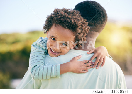 Hug, happy and portrait of a father with a child in nature for love, support and bonding in Jamaica. Smile, care and little boy hugging his dad, holding and together for quality time outdoors Hug, happy and portrait of a father with a child in nature for love, support and bonding in Jamaica. Smile, care and little boy hugging his dad, holding and together for quality time outdoors 133020551