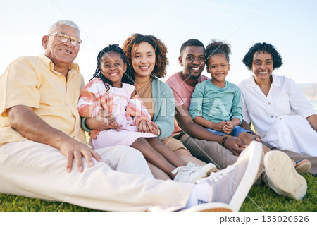 Family, portrait and generations outdoor, happy people relax on lawn with grandparents, parents and kids. Happiness, smile and sitting together on grass, diversity and love with relationship and bond Family, portrait and generations outdoor, happy people relax on lawn with grandparents, parents and kids. Happiness, smile and sitting together on grass, diversity and love with relationship and bond 133020626