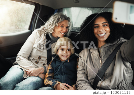 Selfie, smile and family on a road trip in a car for bonding, quality time and a getaway together. Happy, travel and mother, grandmother and a child taking a photo on vacation for social media Selfie, smile and family on a road trip in a car for bonding, quality time and a getaway together. Happy, travel and mother, grandmother and a child taking a photo on vacation for social media 133021115