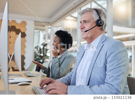 Crm, smile and call center employees at computer in coworking space with senior man with black woman. Office, consulting team and diversity at online advisory agency happy consultant at crm help desk 133021136