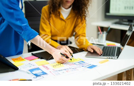 UX graphic designer planning application process development prototype wireframe for web smart phone. 133021402
