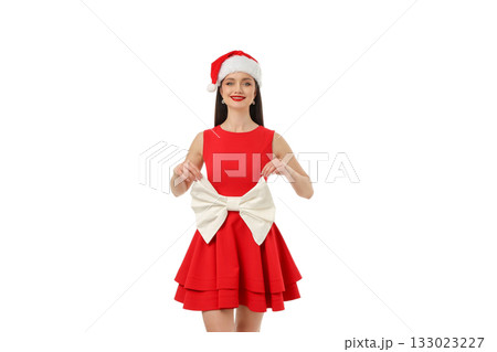 Woman in festive red dress holding white bow with joy, isolated, PNG Woman in festive red dress holding white bow with joy, isolated, PNG 133023227