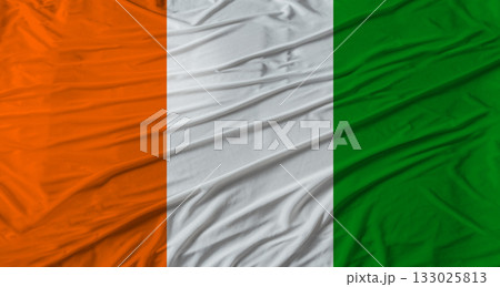 Ivorian flag waving. Flag of Ivory Coast with cloth texture 133025813