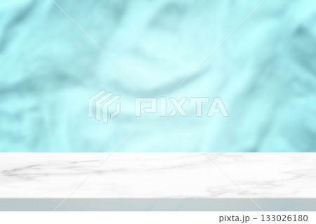 Empty white marble table with blurred glacial wall backdrop Empty white marble table with blurred glacial wall backdrop 133026180