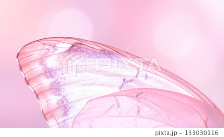 A beautiful swallowtail butterfly with blue and yellow wings on a pink background. 133030116