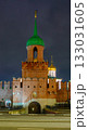 The Odoevsky Gate Tower of the Tula Kremlin with bright night illumination. A majestic view of a historic monument of Russian defensive architecture against a dark sky in Tula, Russia. 133031605