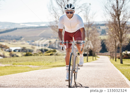 Man, athlete and cycling on park path for exercise training, triathlon sports and sunshine in Denmark. Cyclist, bicycle and travel outdoor in summer, bike fitness challenge or cardio performance Man, athlete and cycling on park path for exercise training, triathlon sports and sunshine in Denmark. Cyclist, bicycle and travel outdoor in summer, bike fitness challenge or cardio performance 133032324
