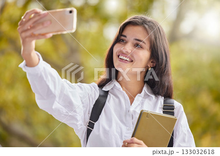 Student, woman and happy for selfie at college, outdoor and smile for social network ui, web or excited in summer. Young gen z girl, influencer or profile picture at university for mobile photography 133032618