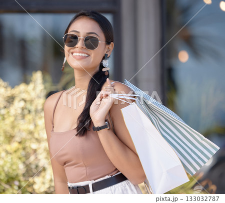 Woman with shopping bag, outdoor market and retail, fashion and happy customer with freedom in city. Luxury with sale, discount and deal at boutique, female with smile for store product and commerce 133032787