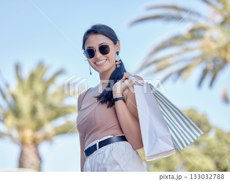 Woman with shopping bag, outdoor mall and retail, fashion and happy customer with freedom in city. Luxury with sale, discount and deal at boutique, female with smile for store product and commerce Woman with shopping bag, outdoor mall and retail, fashion and happy customer with freedom in city. Luxury with sale, discount and deal at boutique, female with smile for store product and commerce 133032788