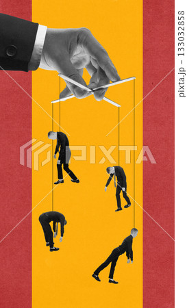 Modern composition of giant hand controlling human puppets on strings against yellow background 133032858