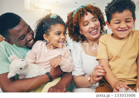 Black family, kids smile and living room sofa with bonding, parent love and care in home. Lounge, happiness and children with mom and dad feeling happy with a hug on a couch with mama and father Black family, kids smile and living room sofa with bonding, parent love and care in home. Lounge, happiness and children with mom and dad feeling happy with a hug on a couch with mama and father 133033006