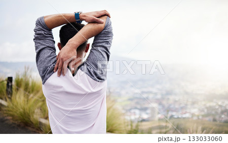 Man, back and fitness stretching arms on mockup in nature for hiking, travel or outdoor mountain exercise. Rear view of sport male in warm up arm stretch getting ready for trekking journey or workout 133033060