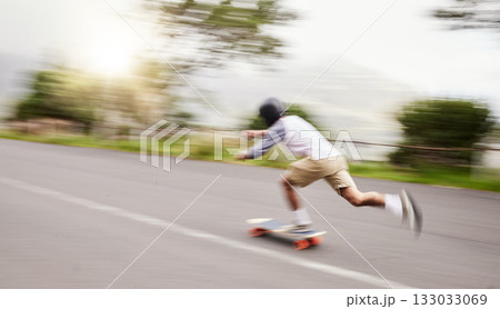 Skateboard, moving and man with motion blur for sports competition, training and exercise on street. Skating, skateboarding and male skater riding for speed, adventure and adrenaline in extreme sport 133033069