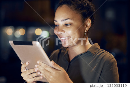 Tablet, night and business woman reading online data analysis, feedback report or customer experience insight. Brand monitoring software, social media research and African worker review web analytics 133033119
