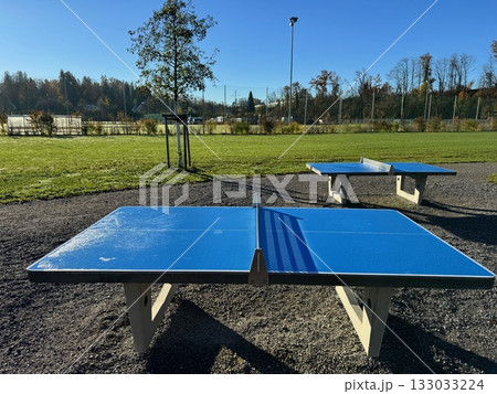 Outdoor Ping-Pong Tables on a Sunny Autumn Day Outdoor Ping-Pong Tables on a Sunny Autumn Day 133033224