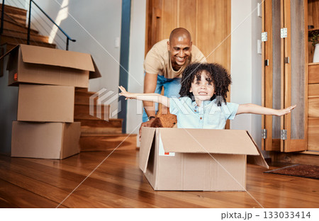 Box, fun and child with father in living room celebrating moving day, rental or real estate. Property, home and boy with parent, cardboard or airplane game while packing for relocating or new house 133033414