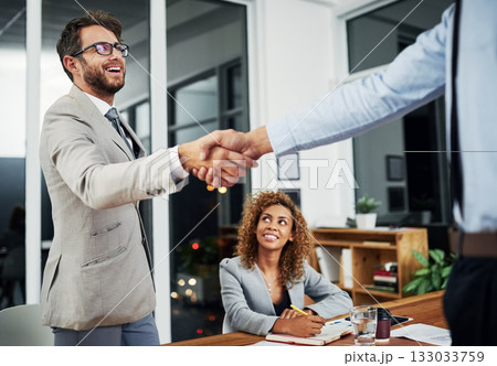 Businessman, shake hand and meeting for an agreement and collaboration after sign contract. Professional, handshake and hiring during recruitment and a negotiation for a new worker in the company. 133033759