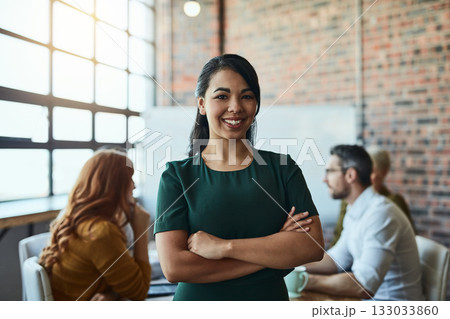 Smile, portrait and business woman with arms crossed in company startup meeting. Face, confidence and happy female leader, professional and person with pride for career, job and success mindset. Smile, portrait and business woman with arms crossed in company startup meeting. Face, confidence and happy female leader, professional and person with pride for career, job and success mindset. 133033860