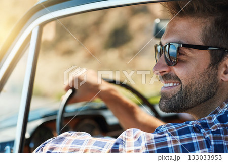 Road trip, travel and man in window of car driving for adventure, summer vacation and holiday. Transportation, relax and face of male person in motor vehicle for freedom, journey and happy on weekend 133033953