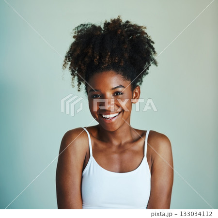 Happiness, youth and portrait of black woman on studio background with afro, smile and skincare. Beauty, dermatology and happy African girl, model with mockup, natural cosmetics and beautiful face. 133034112