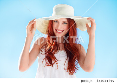 Happy, portrait of young woman with hat in sun and in blue sky background. Mockup, fashion during summer and cheerful female person with ginger or red hair on vacation or holiday outdoor in sunshine Happy, portrait of young woman with hat in sun and in blue sky background. Mockup, fashion during summer and cheerful female person with ginger or red hair on vacation or holiday outdoor in sunshine 133034145