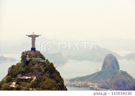 Landscape, monument and aerial of Christ the Redeemer for tourism, sightseeing and travel destination. Traveling, Rio de Janeiro and drone view of statue, sculpture and Brazil landmark on mountain 133034330