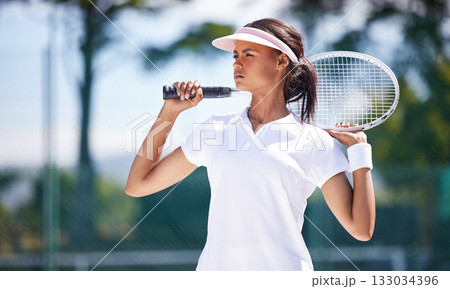 Sports, fitness and tennis racket with woman on court and training for wellness, match and workout. Focus, ready and exercise with girl athlete playing game for cardio, health and competition 133034396