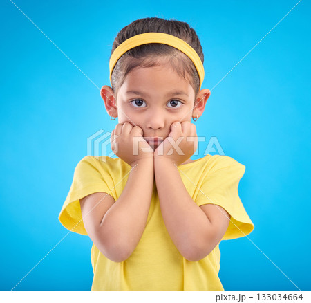Mockup, portrait and girl nervous, scared and overwhelmed against a blue studio background. Face, female child and kid with anxiety, stress and worried with mental health, anxious and panic reaction Mockup, portrait and girl nervous, scared and overwhelmed against a blue studio background. Face, female child and kid with anxiety, stress and worried with mental health, anxious and panic reaction 133034664