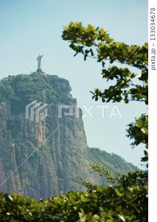 Brazil, monument and Christ the Redeemer on mountain for tourism, sightseeing and travel destination. Traveling, global architecture and statue, sculpture and city landmark on Rio de Janeiro on hill 133034678