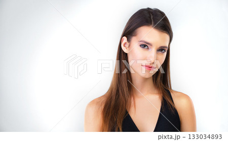 Woman, portrait and mockup with makeup, cosmetics and natural beauty aesthetic in a studio. Isolated, white background and young female model with mock up for advertisement and luxury branding 133034893