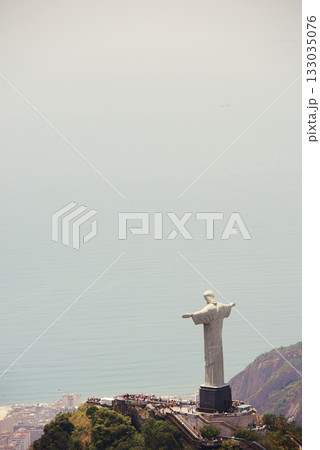 Brazil, monument and Christ the Redeemer by ocean for tourism, sightseeing and travel destination. Landscape, Rio de Janeiro mockup and aerial view of statue, sculpture and landmark on mountain Brazil, monument and Christ the Redeemer by ocean for tourism, sightseeing and travel destination. Landscape, Rio de Janeiro mockup and aerial view of statue, sculpture and landmark on mountain 133035076