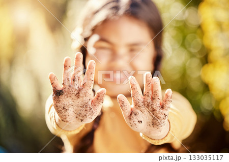 Dirt soil hands, girl child and gardening mockup with blurred background with smile, happiness and outdoor. Kid, garden development and backyard for sustainability, learning and ecology for growth Dirt soil hands, girl child and gardening mockup with blurred background with smile, happiness and outdoor. Kid, garden development and backyard for sustainability, learning and ecology for growth 133035117