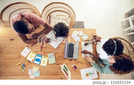 Elearning, eduction and homework with black family at table from top view for creative, care and tutor. Distance learning, schoolwork and child development with parents and children for online course 133035134