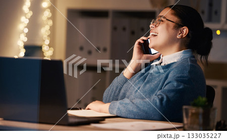 Business woman, phone call and laughing in office at night, chatting or speaking to contact. Bokeh, overtime or happy female employee with mobile smartphone for funny conversation or comic discussion 133035227