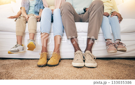 Relax, legs and shoes of black family on sofa for bonding, break and rest together. Support, connection and quality time with parents and children in living room at home for comfort, care and feet Relax, legs and shoes of black family on sofa for bonding, break and rest together. Support, connection and quality time with parents and children in living room at home for comfort, care and feet 133035386