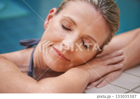 Swimming pool, eyes closed or woman relax on holiday, summer vacation or weekend getaway. Travel, luxury or spa resort for female swimmer, face or person relaxing in water calm, wellness or sun tan Swimming pool, eyes closed or woman relax on holiday, summer vacation or weekend getaway. Travel, luxury or spa resort for female swimmer, face or person relaxing in water calm, wellness or sun tan 133035387