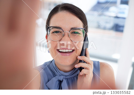 Portrait, phone call and woman taking selfie happy and smile having mobile conversation or communication in an office. Face, head and female corporate employee with cellphone or smartphone Portrait, phone call and woman taking selfie happy and smile having mobile conversation or communication in an office. Face, head and female corporate employee with cellphone or smartphone 133035582