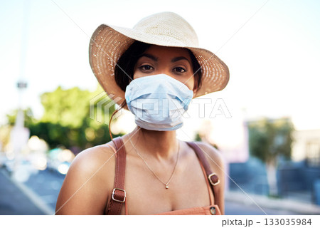Covid, portrait and woman in travel with face mask for health and on city background. Compliance, safety for wellness and female person outdoors with facial protection for corona virus pandemic Covid, portrait and woman in travel with face mask for health and on city background. Compliance, safety for wellness and female person outdoors with facial protection for corona virus pandemic 133035984