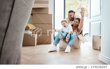 Happy family play in cardboard box for new house, moving and real estate celebration, investment and excited game. Mom, dad and kid or child play in boxes while moving into property home together 133036087